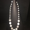 Beautifully made beaded necklaces in shades of white